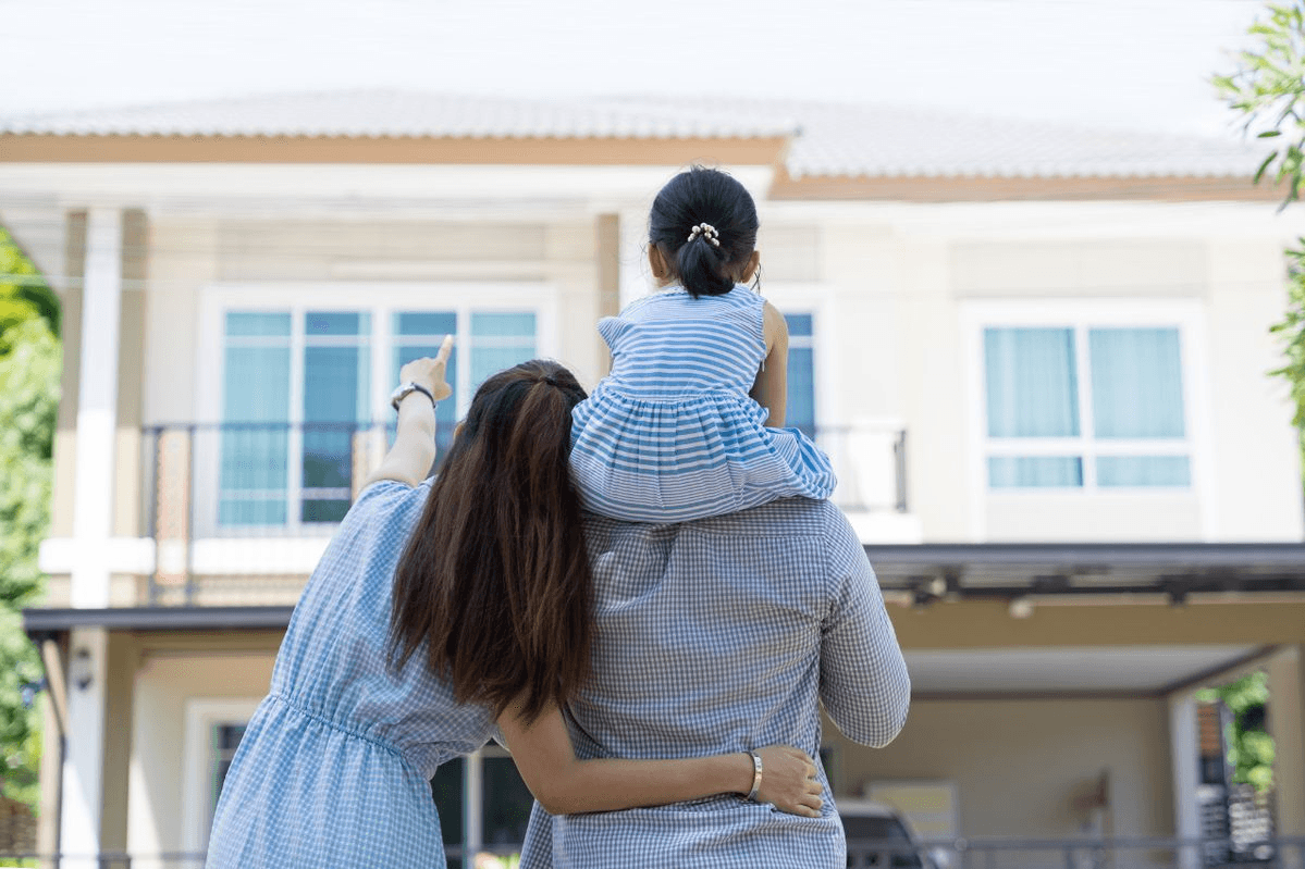 Family looking at their dream home